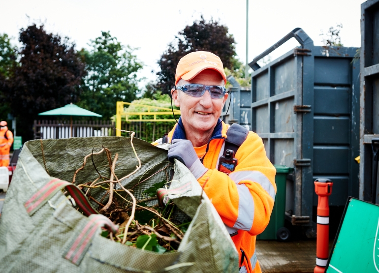 Ioannis carrying green waste at Kings Road Recycling Centre 